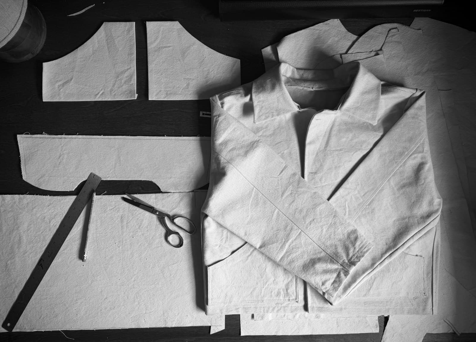 Pattern pieces and the toile on the cutting table