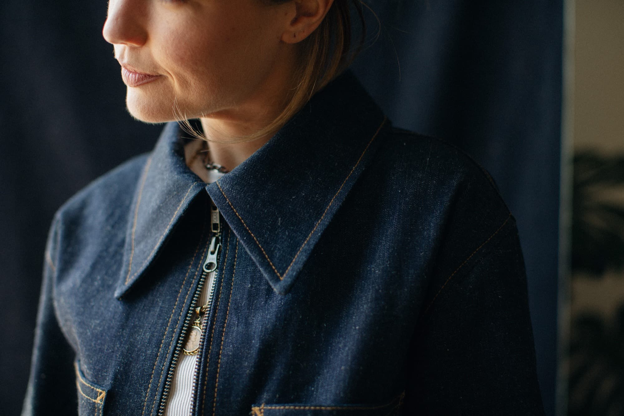 The women’s work coat collar and zip, worn